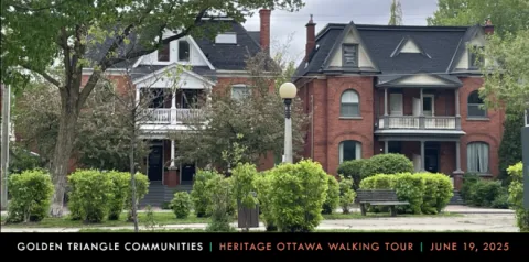 Two adjacent red brick duplex homes, each typical of the downtown region of Ottawa.